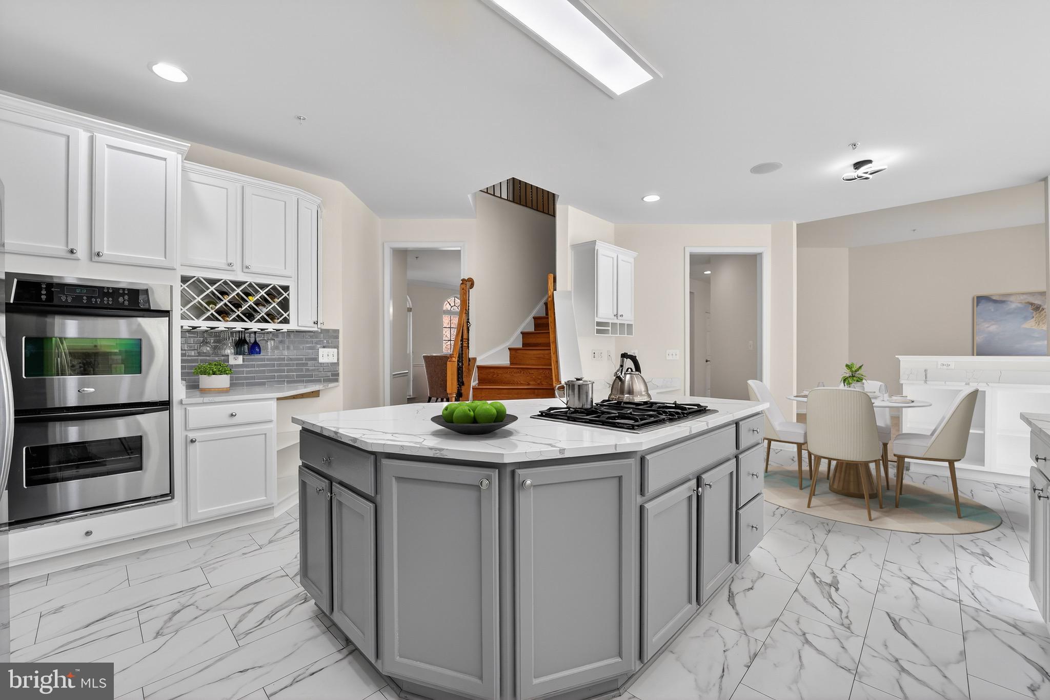 16101 Venice Road Aquasco, MD 20608 - Photo 17 of 60 a kitchen with stainless steel appliances granite countertop a stove and a sink