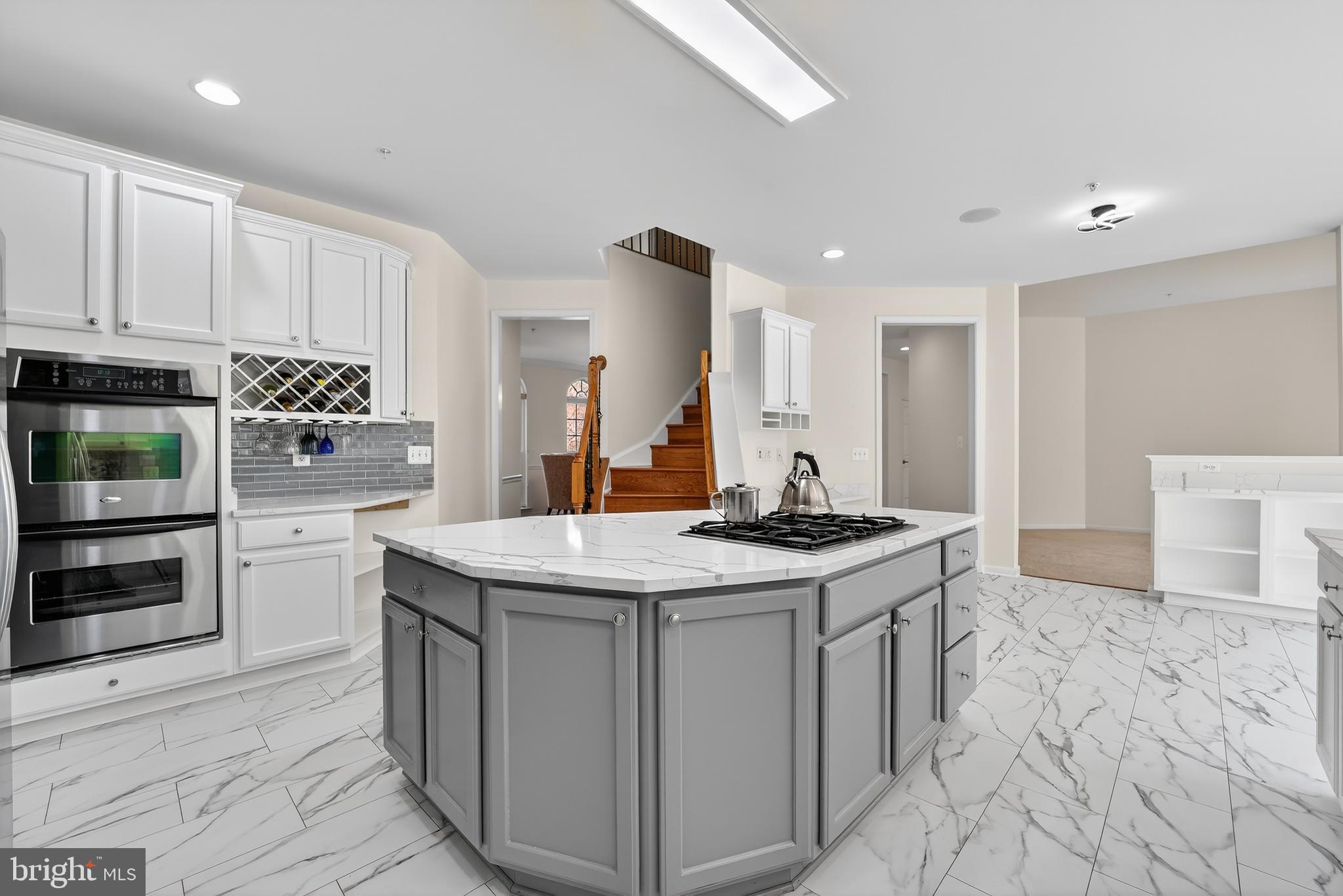 16101 Venice Road Aquasco, MD 20608 - Photo 20 of 60 a kitchen with stainless steel appliances granite countertop a sink stove and cabinets