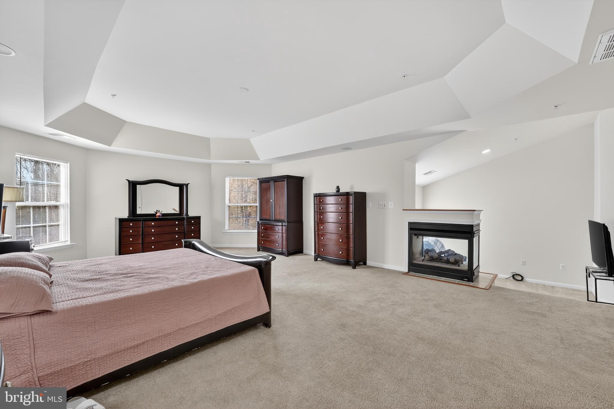 16101 Venice Road Aquasco, MD 20608 - Photo 36 of 60 a bedroom with a bed and a television