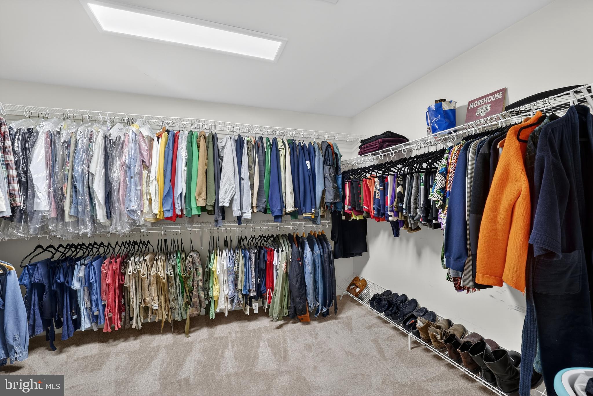 16101 Venice Road Aquasco, MD 20608 - Photo 43 of 60 a view of walk in closet with clothes and shoes