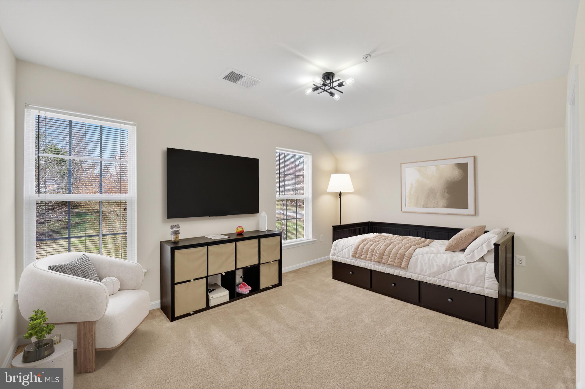 16101 Venice Road Aquasco, MD 20608 - Photo 49 of 60 a living room with furniture and a flat screen tv