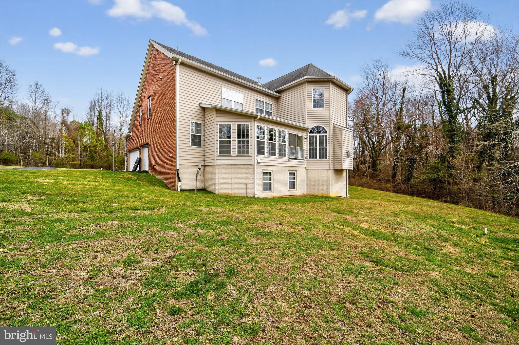 16101 Venice Road Aquasco, MD 20608 - Photo 53 of 60 a view of a house with a big yard and large trees