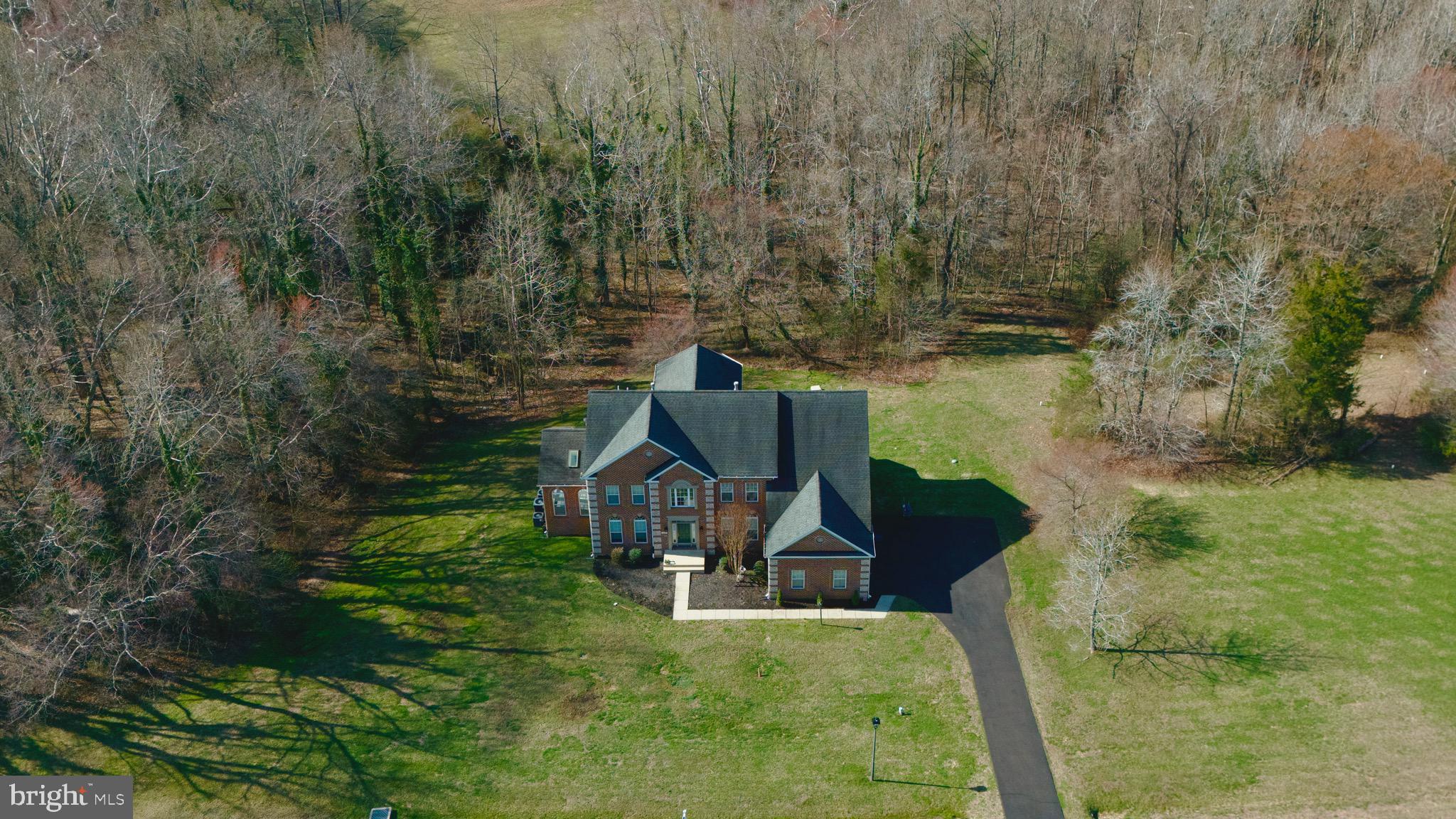 16101 Venice Road Aquasco, MD 20608 - Photo 59 of 60 a view of a house with a yard