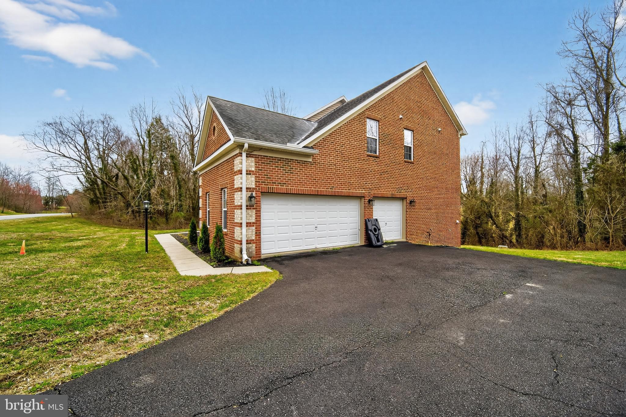 16101 Venice Road Aquasco, MD 20608 - Photo 6 of 60 a front view of a house with garden