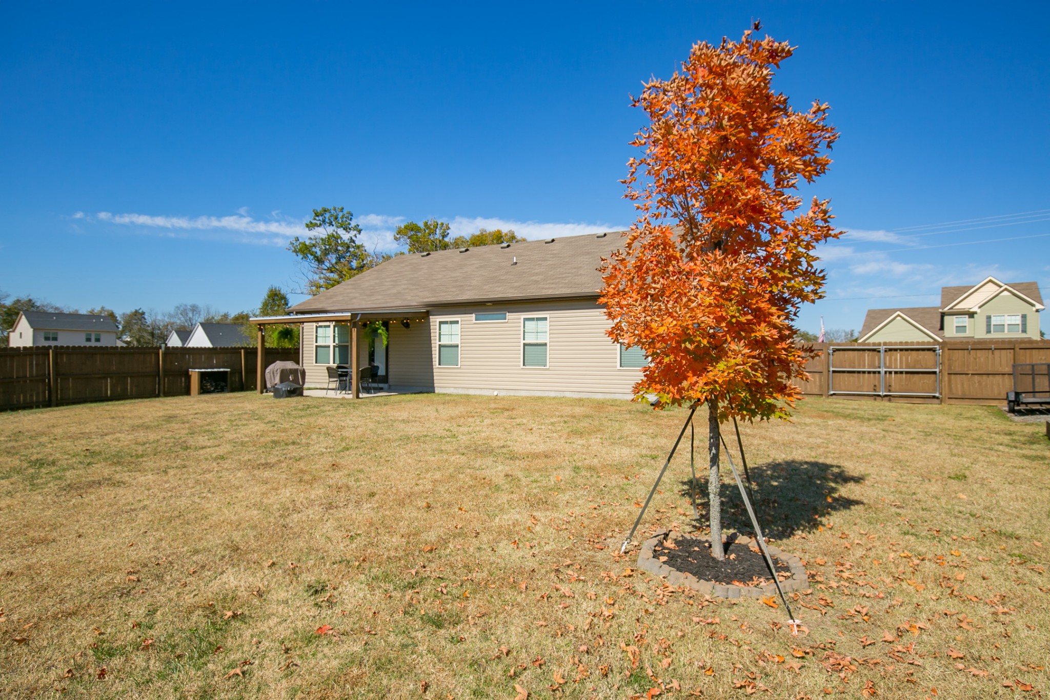 125 Copper Leaf Road Murfreesboro, TN 37128 - Photo 11 of 50 a house with trees in the background