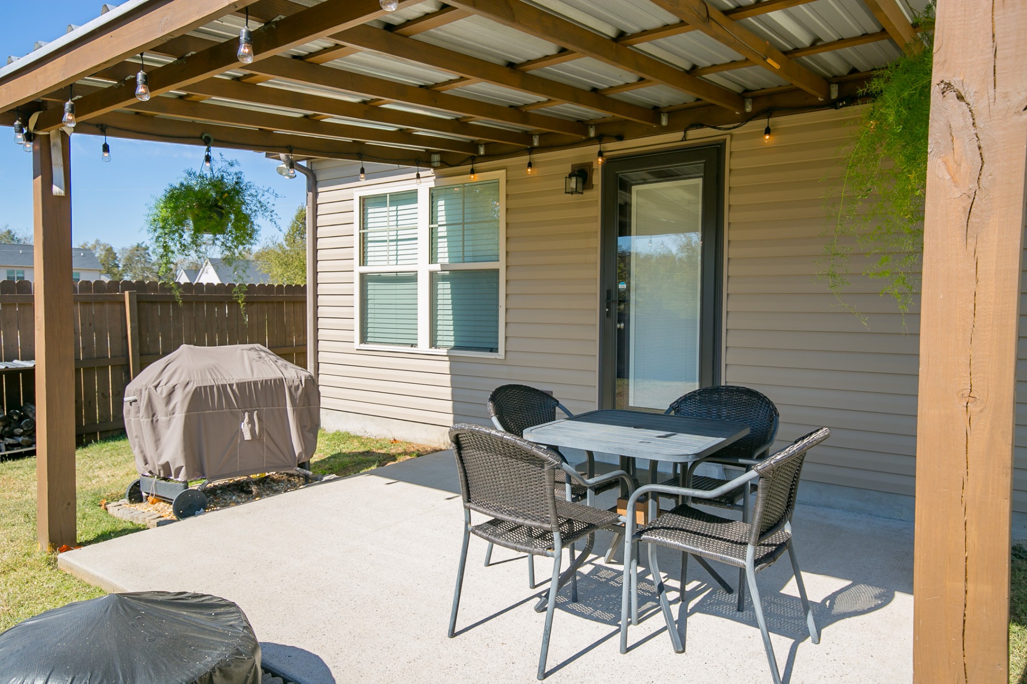 125 Copper Leaf Road Murfreesboro, TN 37128 - Photo 15 of 50 a backyard of a house with table and chairs