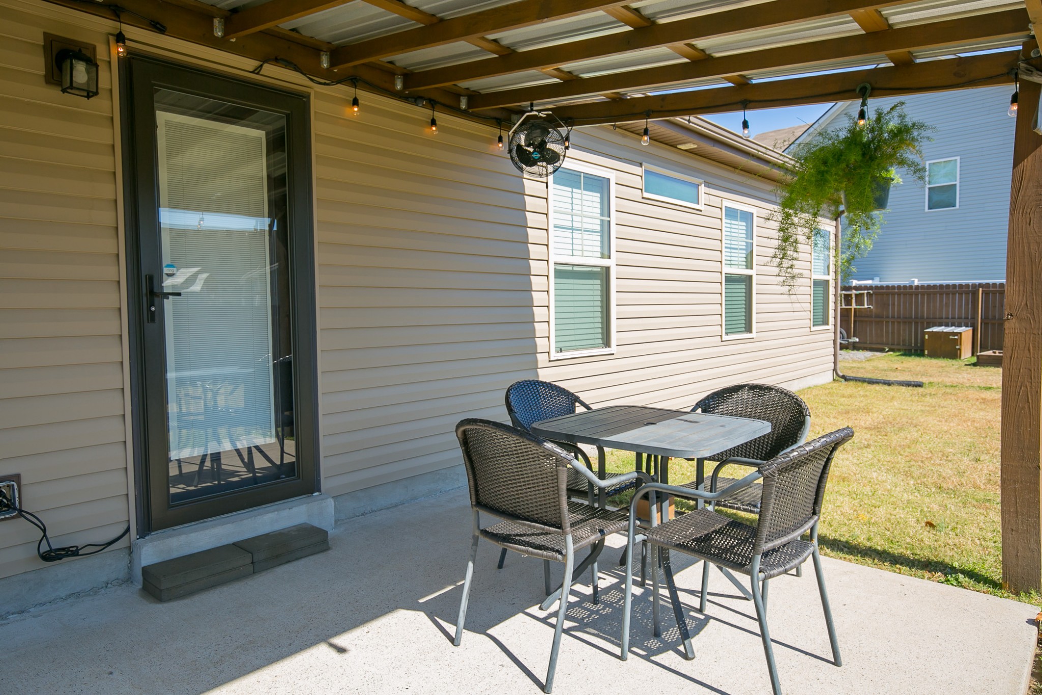 125 Copper Leaf Road Murfreesboro, TN 37128 - Photo 16 of 50 a patio with table and chairs and potted plants