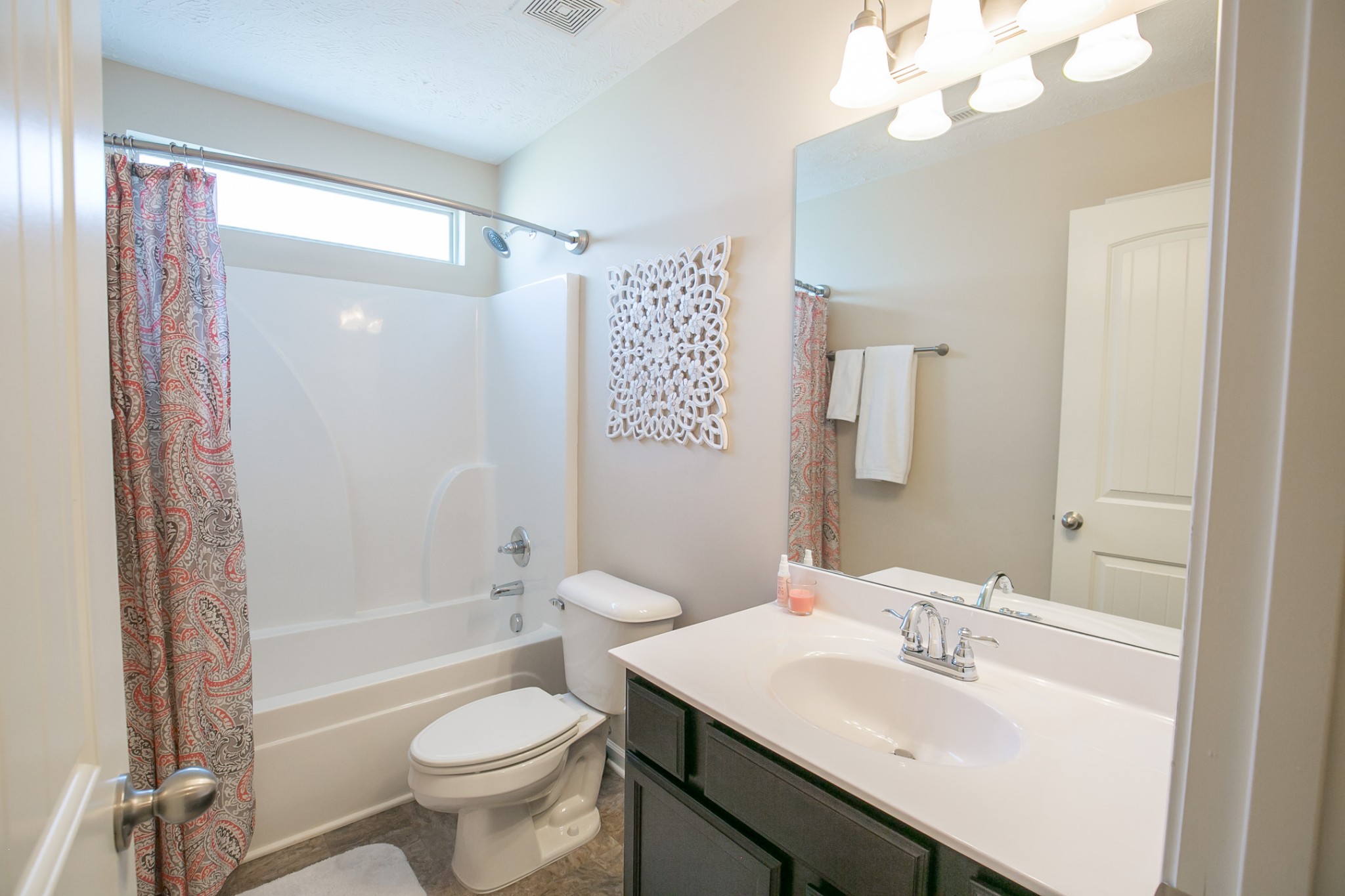 125 Copper Leaf Road Murfreesboro, TN 37128 - Photo 18 of 50 a bathroom with a sink toilet tub and shower