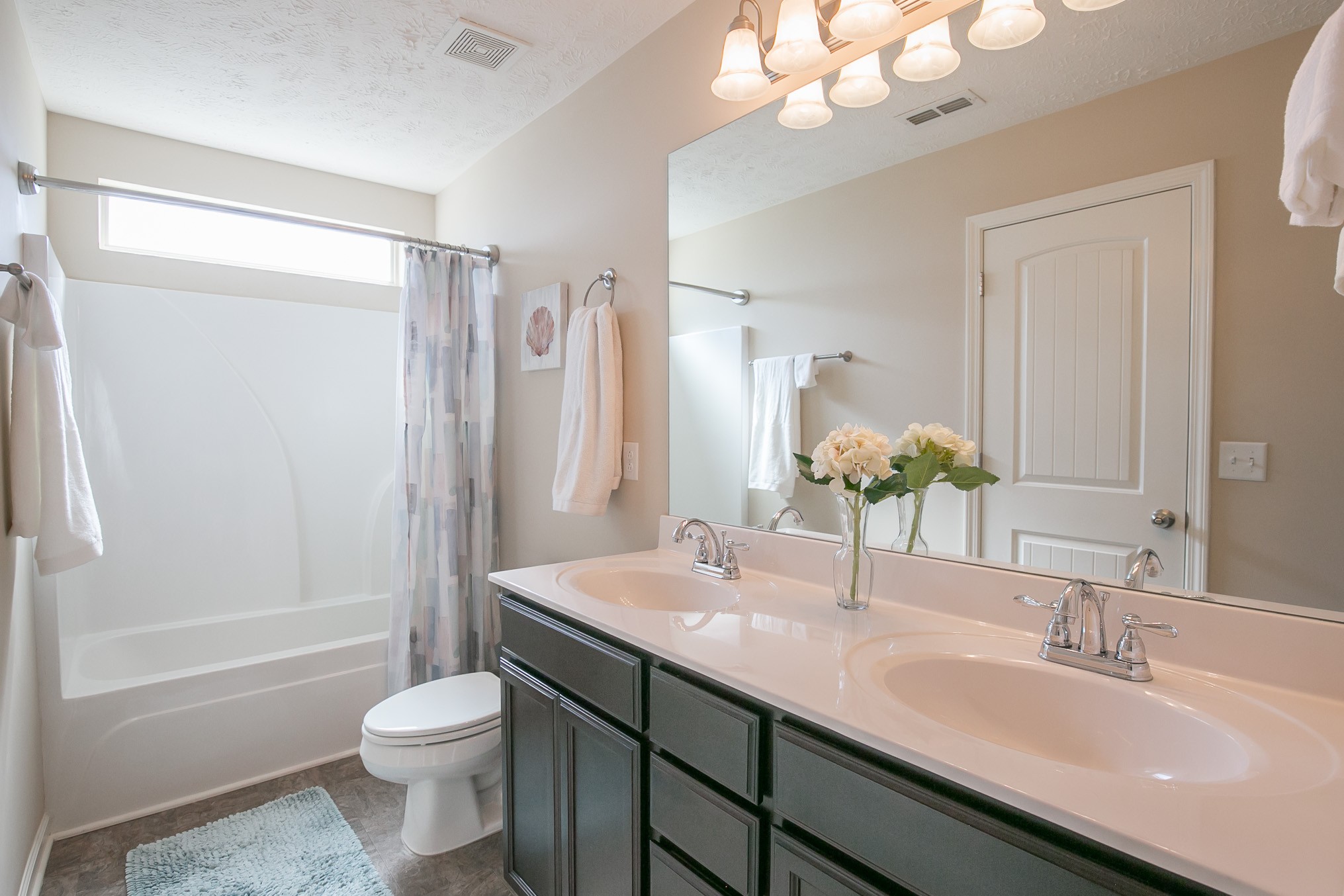 125 Copper Leaf Road Murfreesboro, TN 37128 - Photo 26 of 50 a bathroom with a granite countertop sink toilet and shower