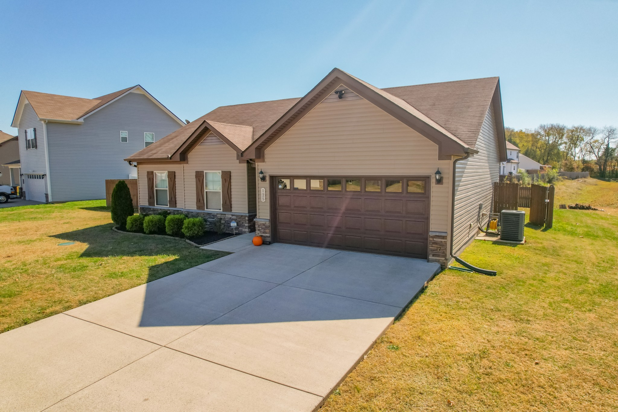 125 Copper Leaf Road Murfreesboro, TN 37128 - Photo 3 of 50 a front view of a house with yard