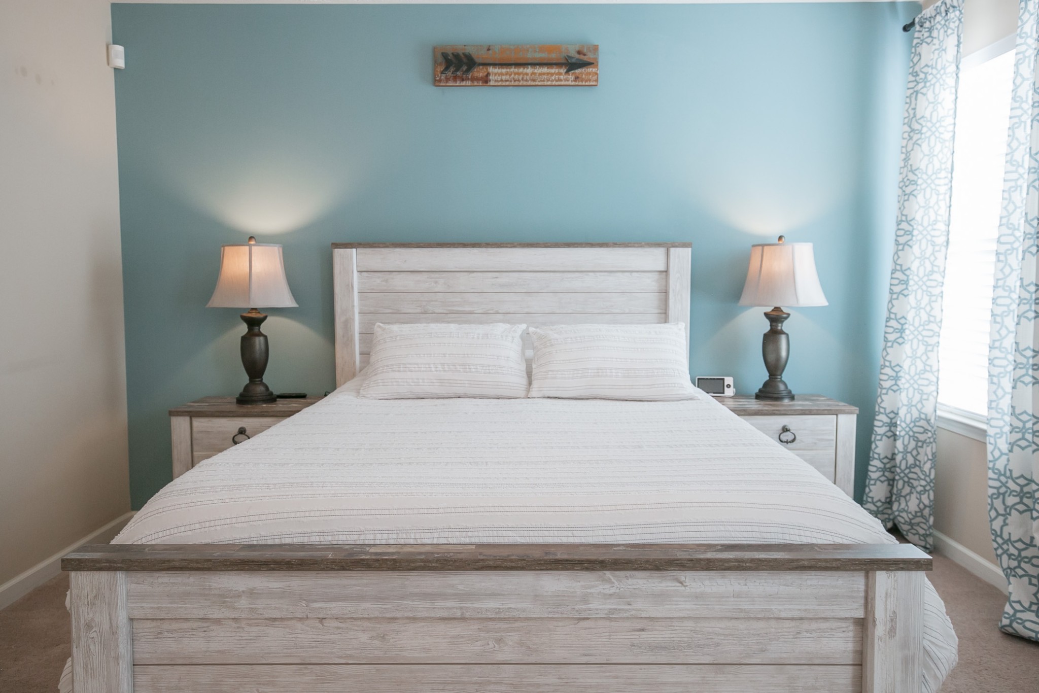 125 Copper Leaf Road Murfreesboro, TN 37128 - Photo 36 of 50 a bedroom with a bed and a lamp