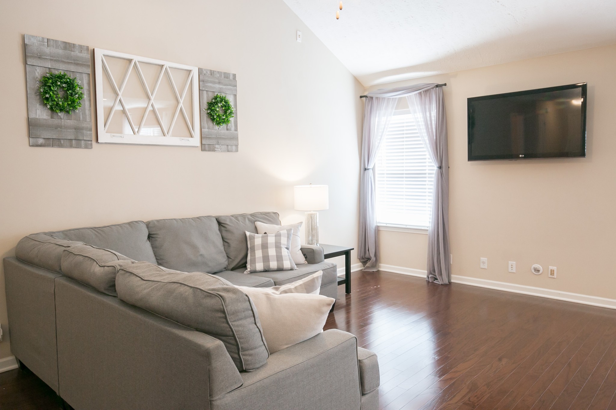 125 Copper Leaf Road Murfreesboro, TN 37128 - Photo 38 of 50 a living room with furniture and a flat screen tv