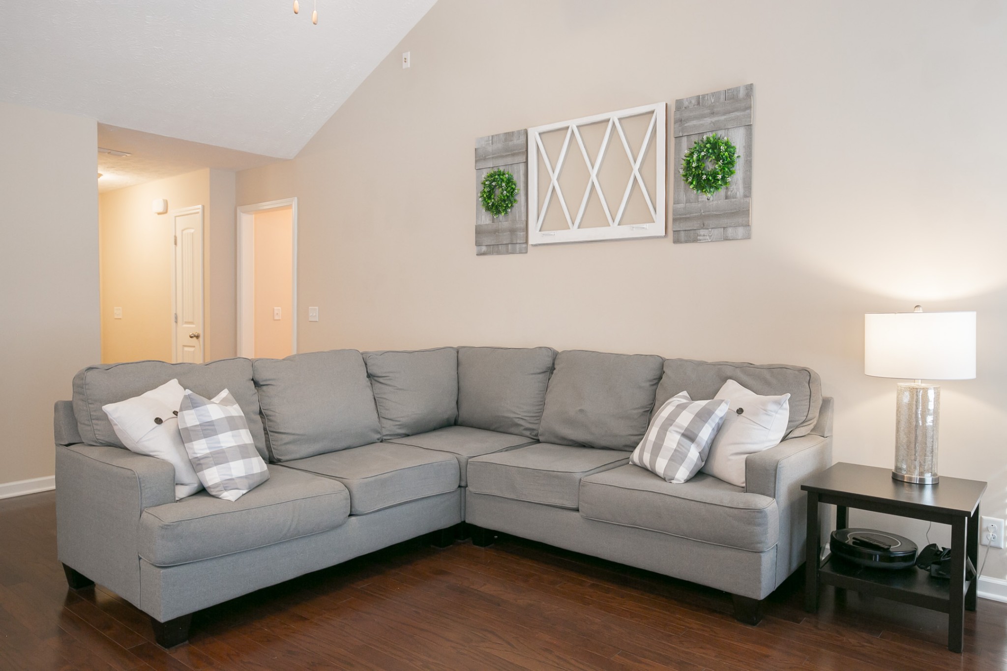 125 Copper Leaf Road Murfreesboro, TN 37128 - Photo 39 of 50 a living room with furniture and a lamp