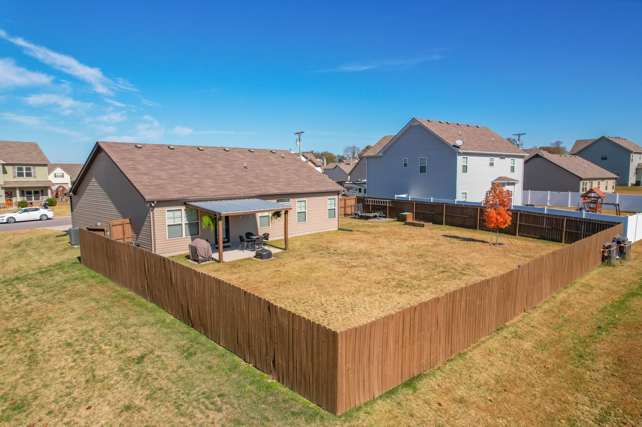 125 Copper Leaf Road Murfreesboro, TN 37128 - Photo 4 of 50 a view of a house with wooden fence