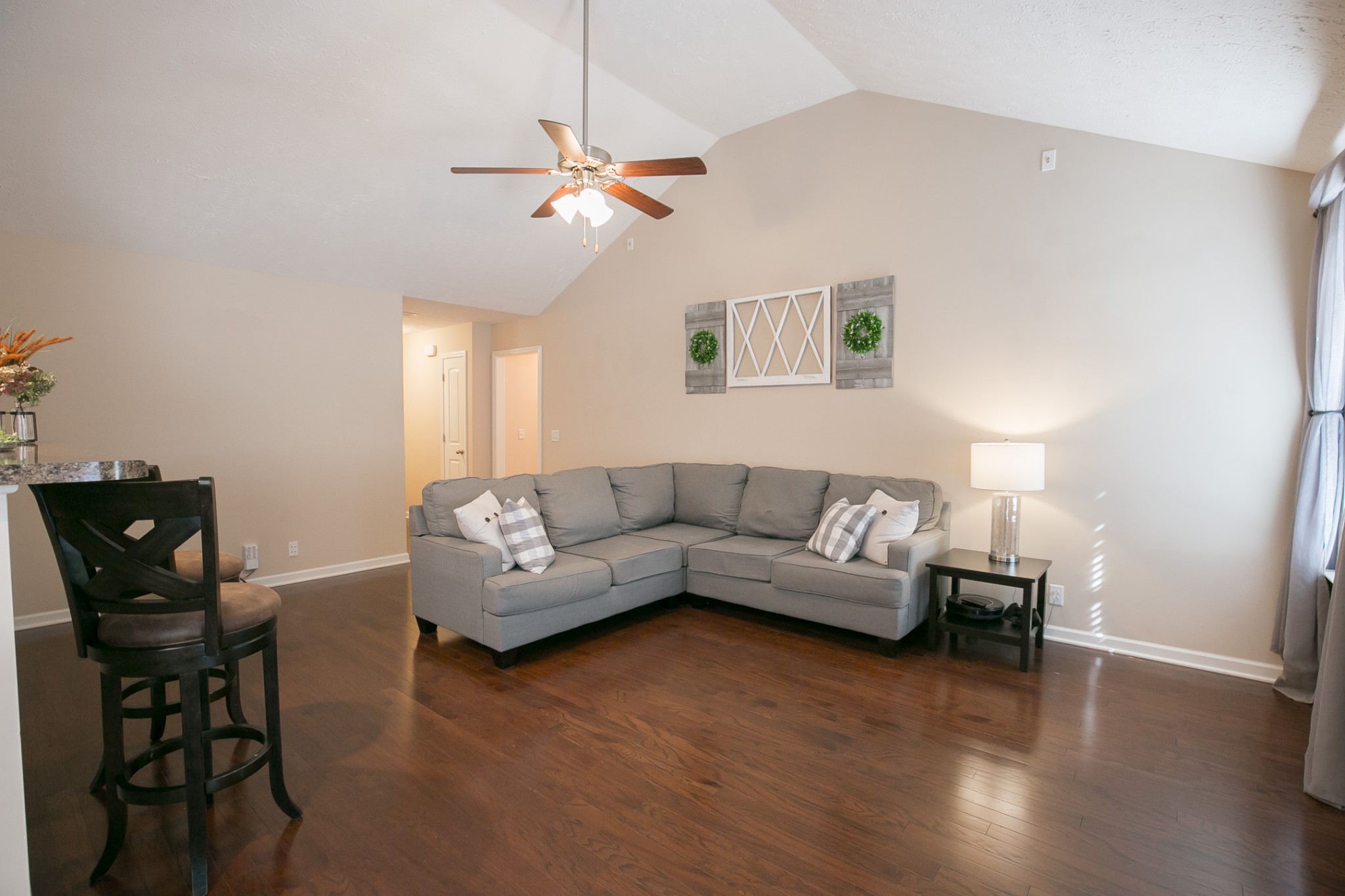 125 Copper Leaf Road Murfreesboro, TN 37128 - Photo 49 of 50 a living room with furniture and a wooden floor