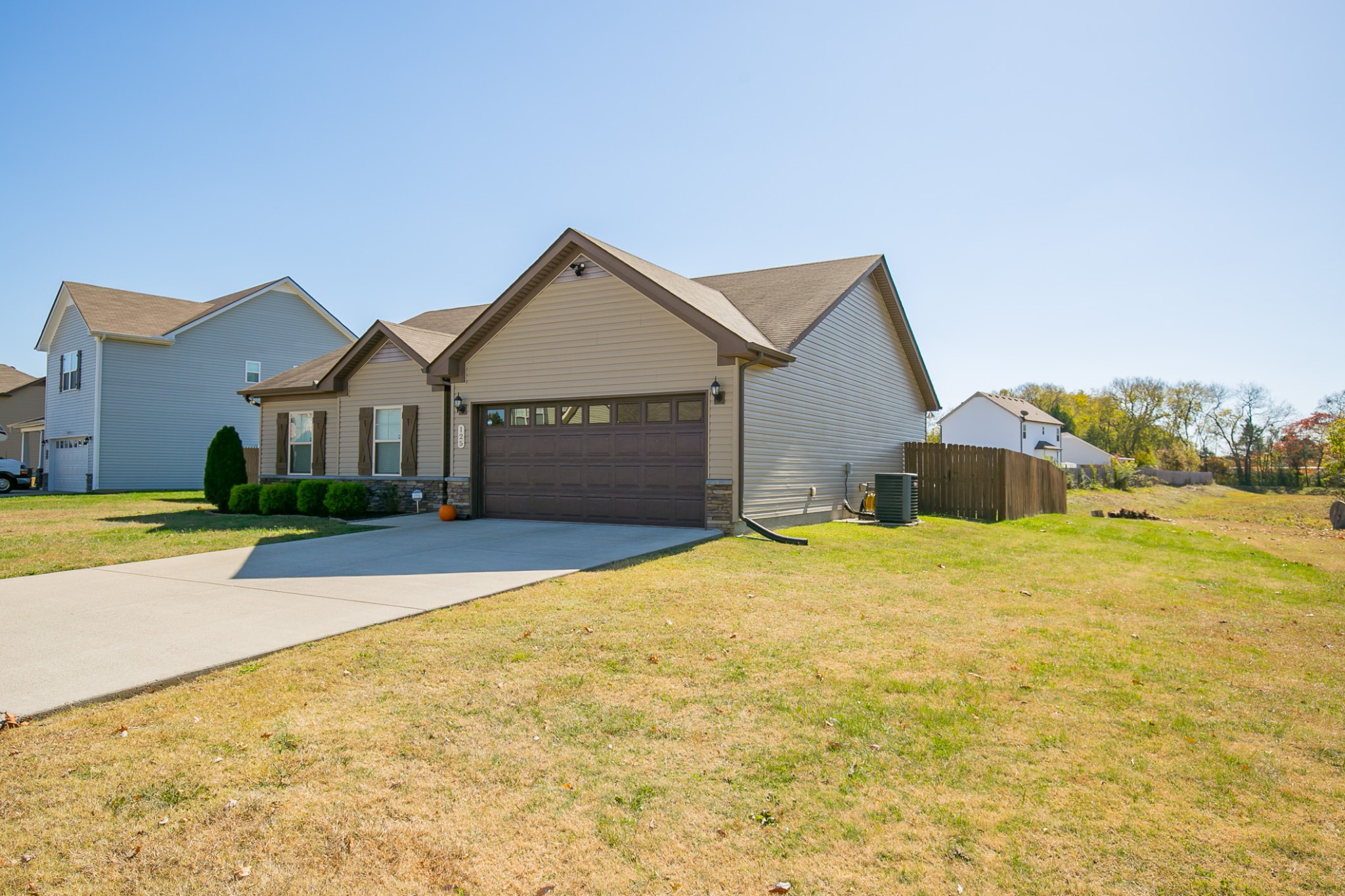 125 Copper Leaf Road Murfreesboro, TN 37128 - Photo 8 of 50 a front view of a house with a yard and garage