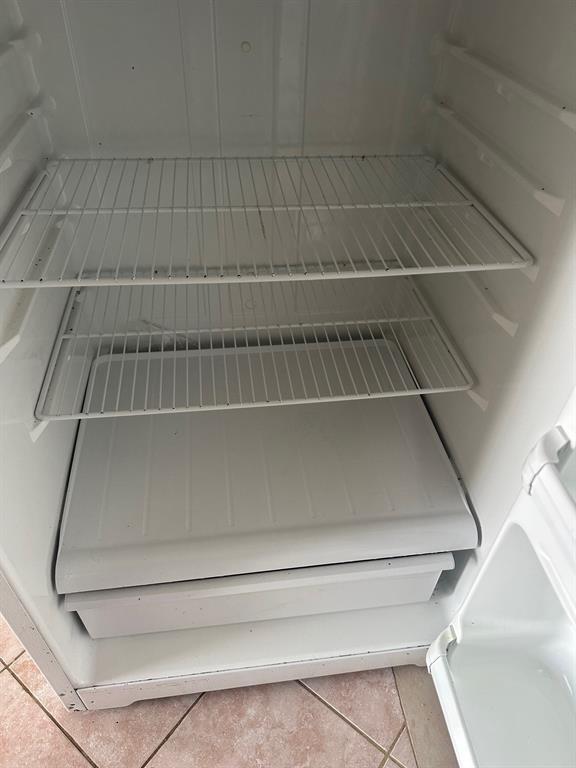 4610 Chaha Road, Unit 101 Garland, TX 75043 - Photo 14 of 18 a view of staircase with white walls and a window