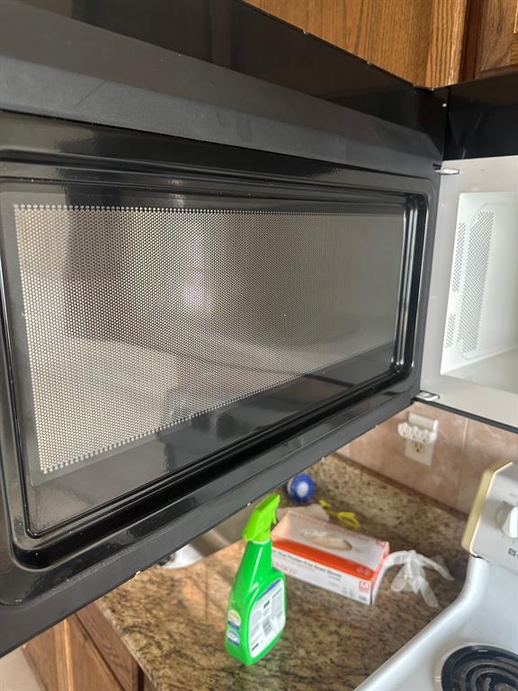 4610 Chaha Road, Unit 101 Garland, TX 75043 - Photo 18 of 18 a room with a couch