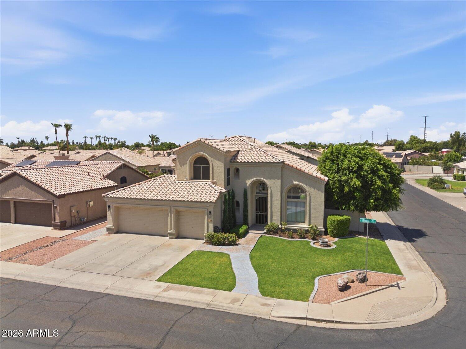 1894 East Mineral Road Gilbert, AZ 85234 - Photo 37 of 48 a view of a house with a yard