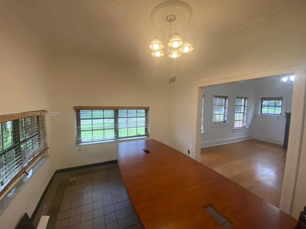a view of an empty room and window