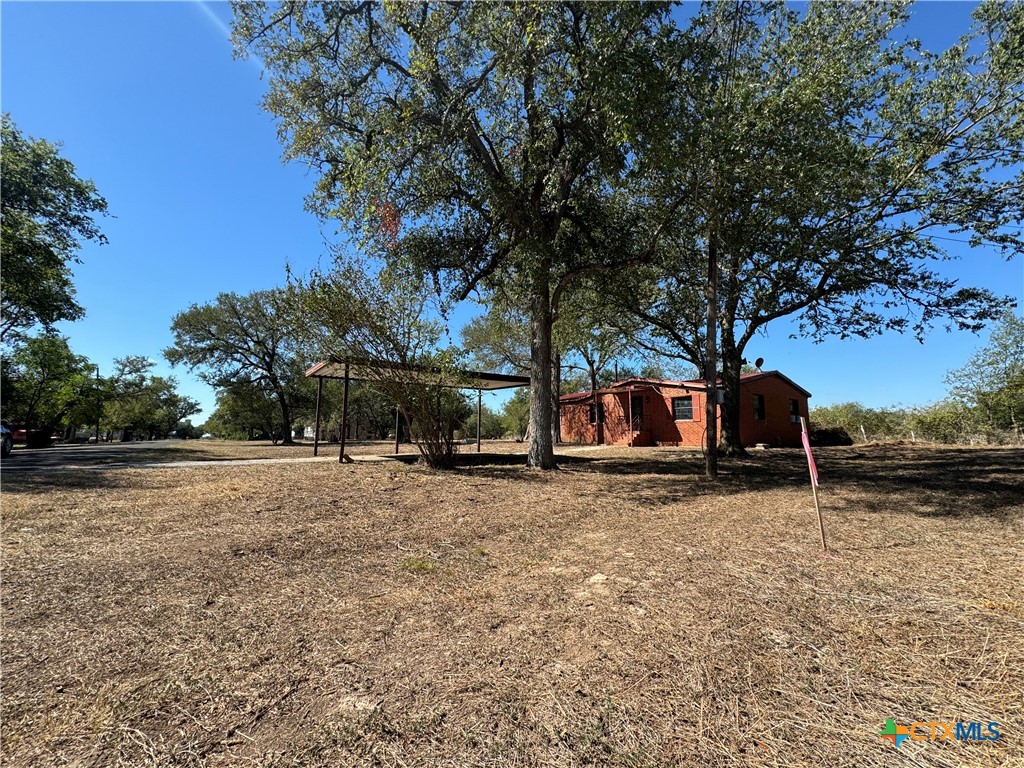a house with trees in the background