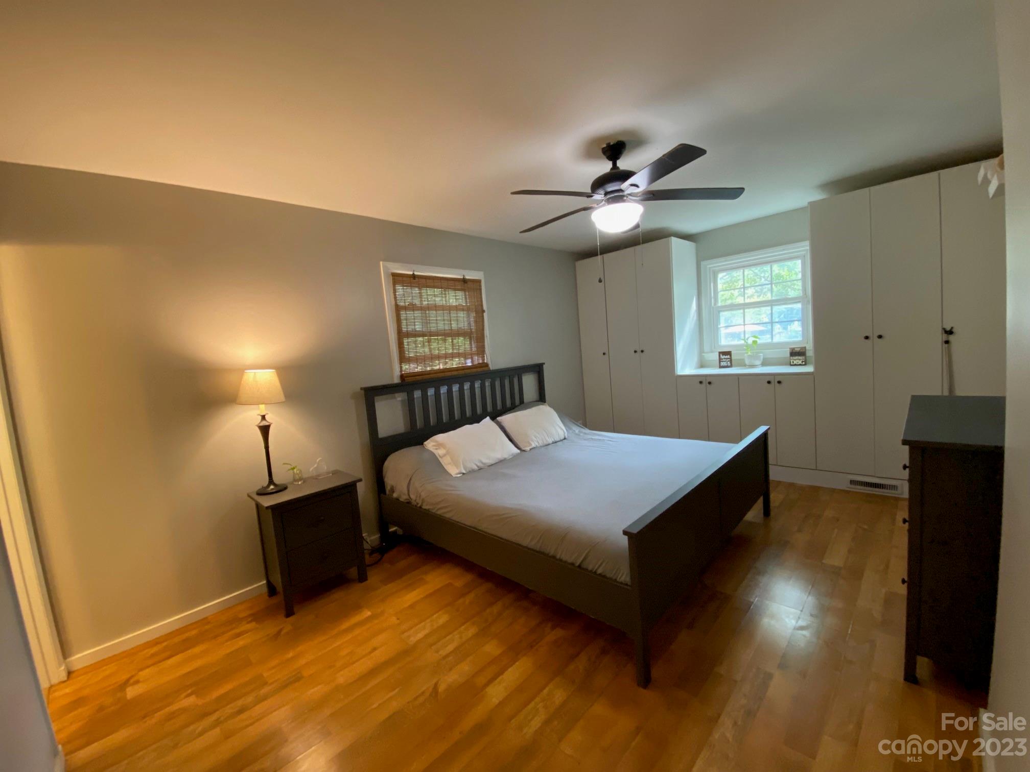 5901 Potter Road Matthews, NC 28104 - Photo 22 of 38 a bedroom with a bed and a flat screen tv