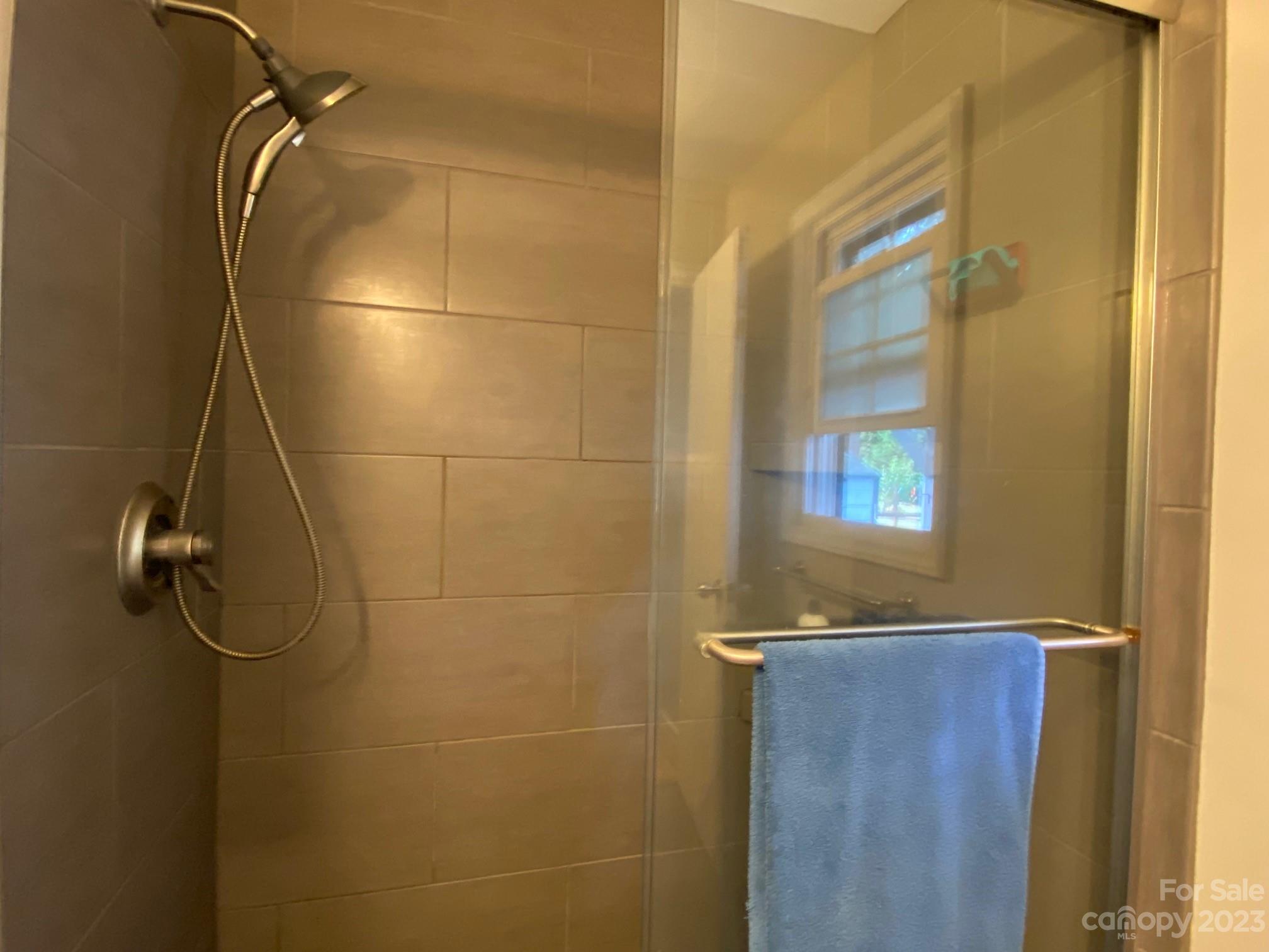 5901 Potter Road Matthews, NC 28104 - Photo 27 of 38 a bathroom with a shower