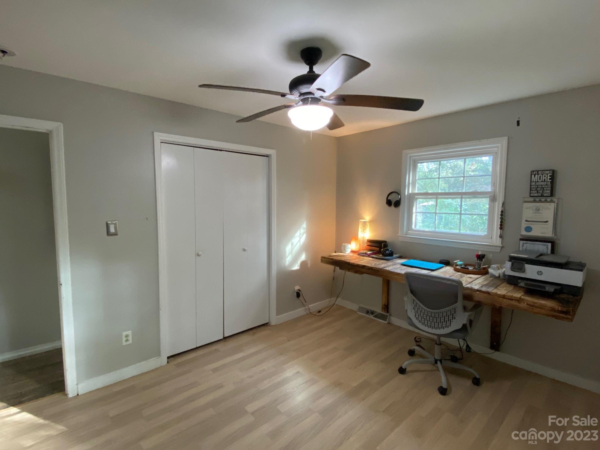 5901 Potter Road Matthews, NC 28104 - Photo 30 of 38 a view of a workspace with furniture and a window