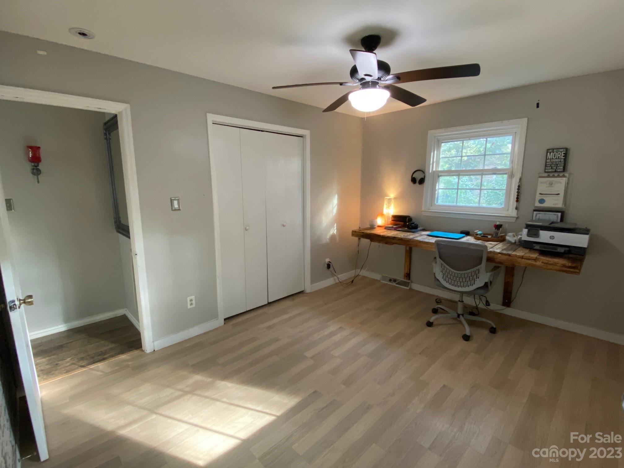5901 Potter Road Matthews, NC 28104 - Photo 31 of 38 a view of a workspace with furniture and a window