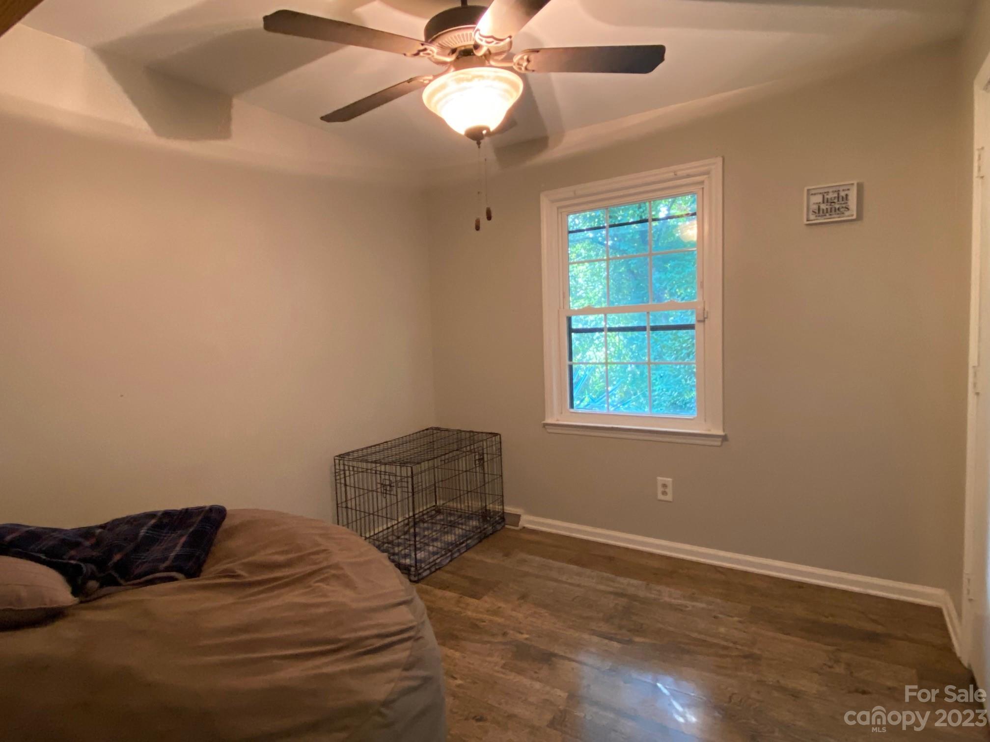 5901 Potter Road Matthews, NC 28104 - Photo 32 of 38 a bedroom with a bed and a window