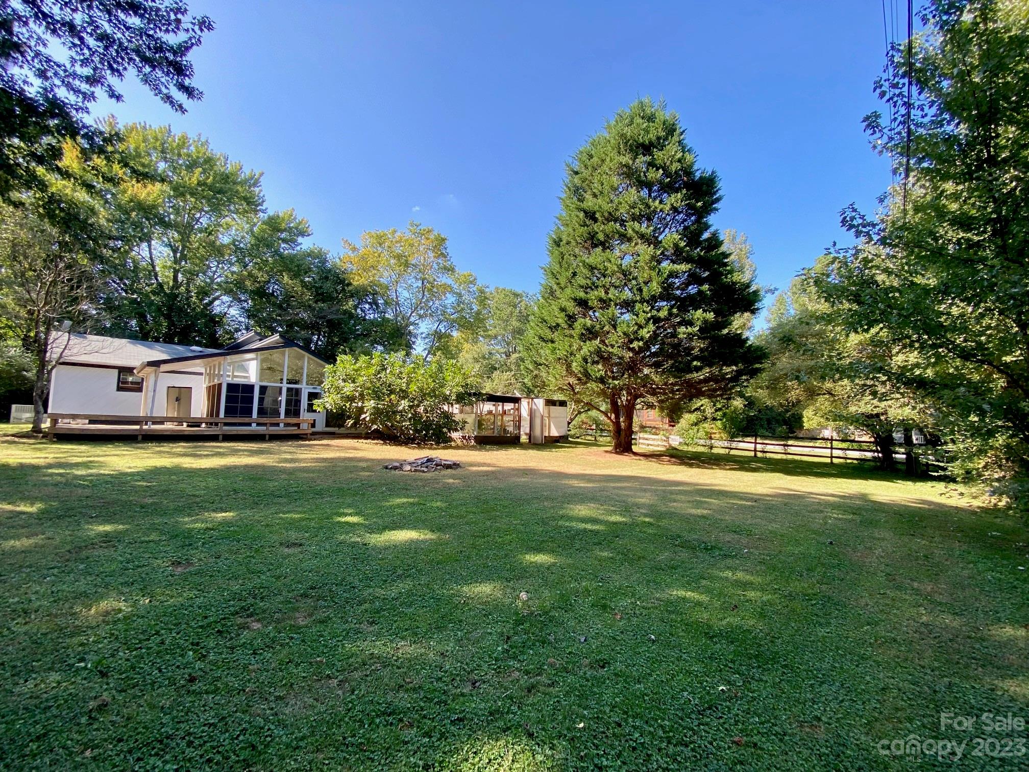5901 Potter Road Matthews, NC 28104 - Photo 7 of 38 a front view of a house with a yard