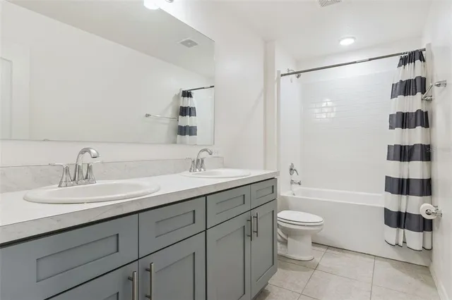 a bedroom with a bed and a shower