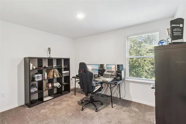a view of a hallway with a window