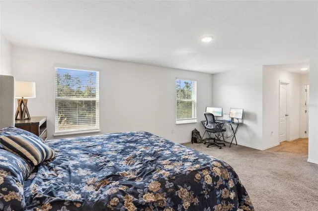 a bathroom with a sink and a window