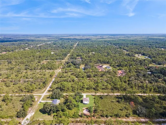 a view of an outdoor space and a yard