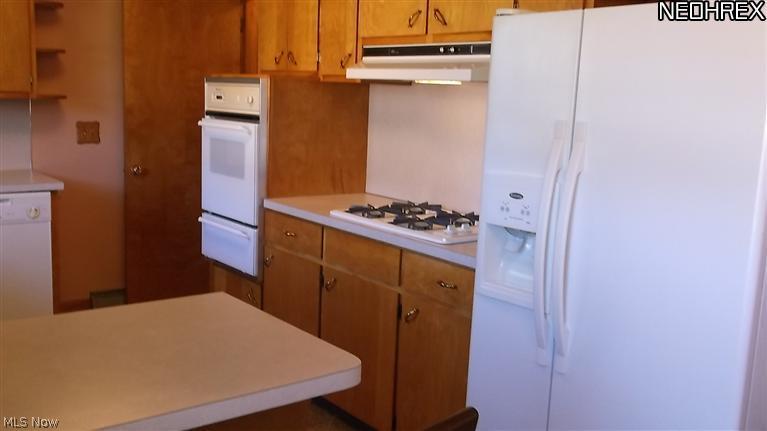 4409 8th Street Northwest Canton, OH 44708 - Photo 6 of 20 wood is in great condition through the entire home. Appliances stay.
