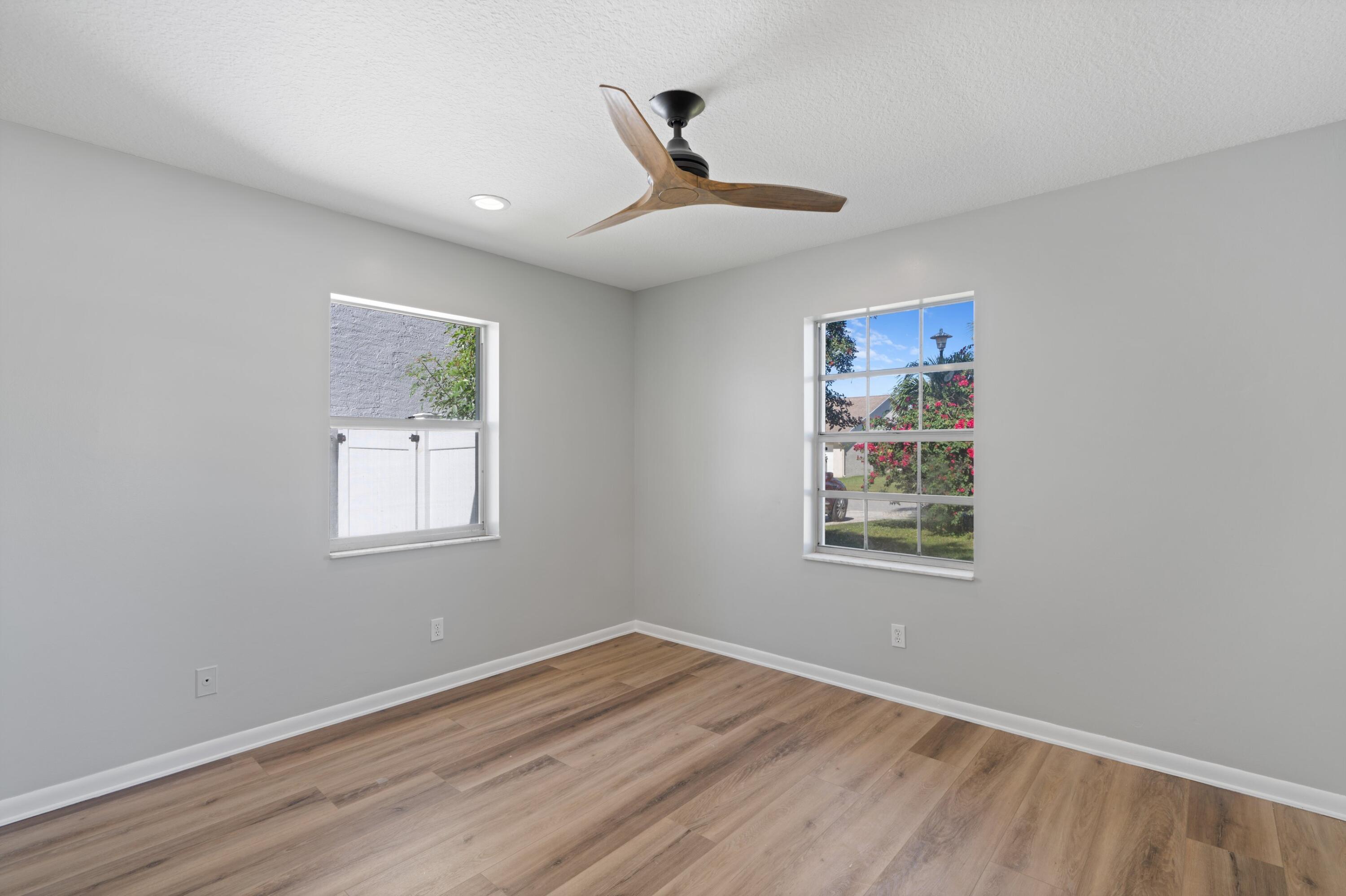 177 Arrowhead Circle Jupiter, FL 33458 - Photo 19 of 24 Bedroom 3