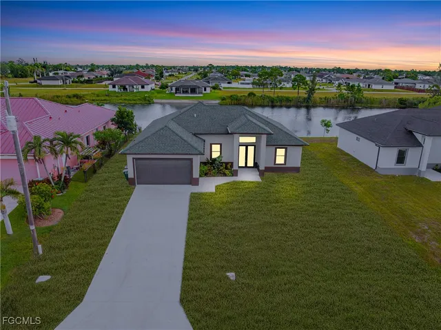swimming pool with outdoor seating and yard in back