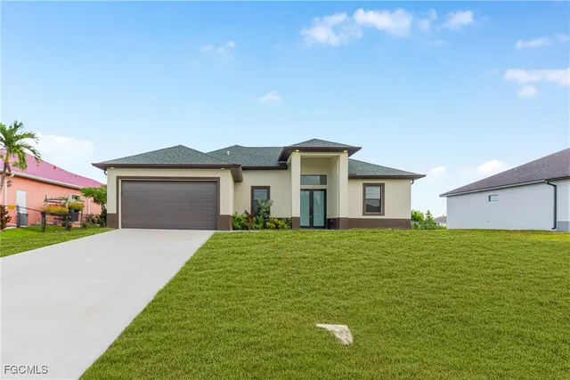 a house view with a garden space