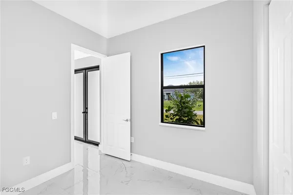 a view of a hallway with closet