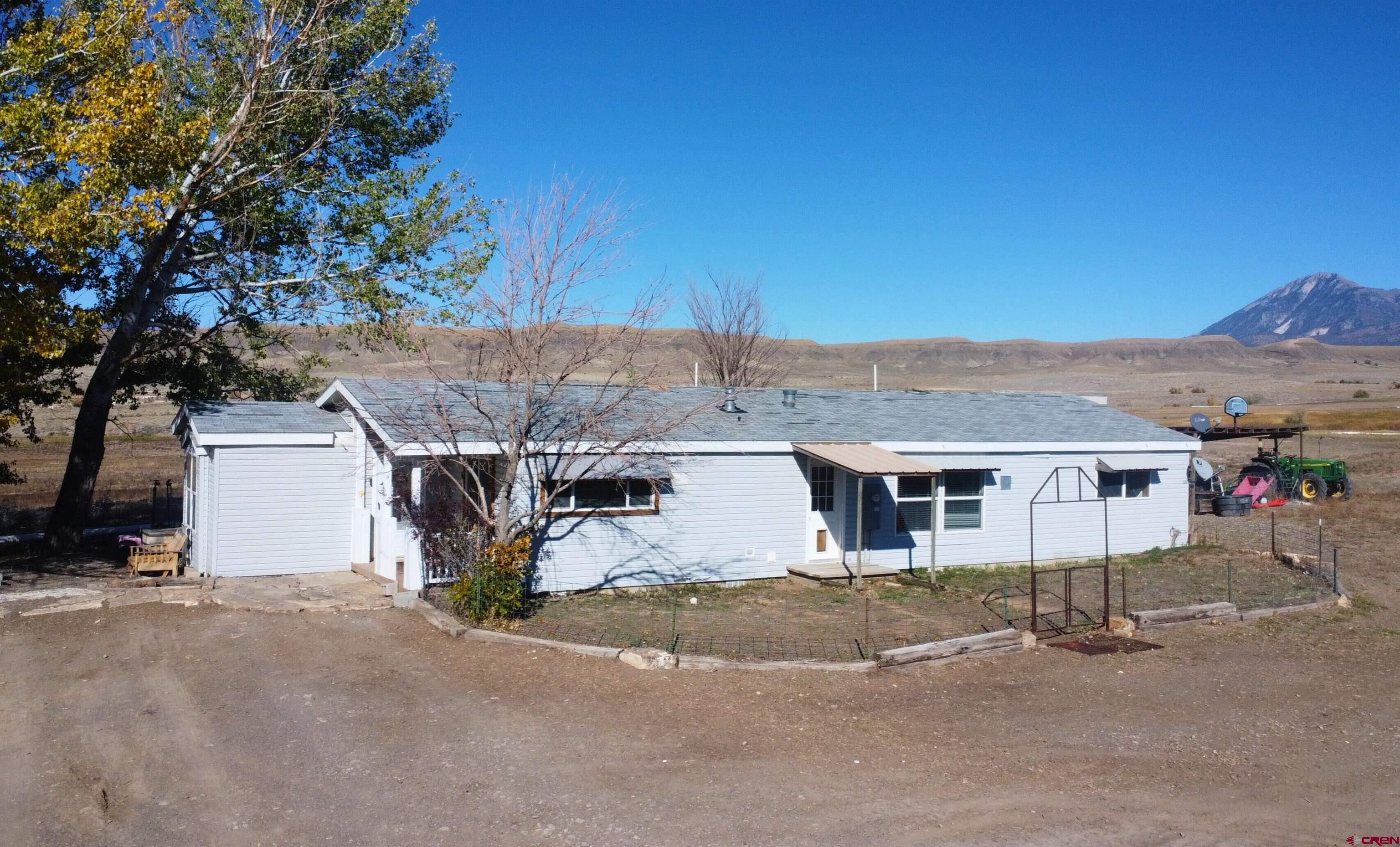 34607 F50 Road Hotchkiss, CO 81419 - Photo 20 of 38 a view of a house with a road