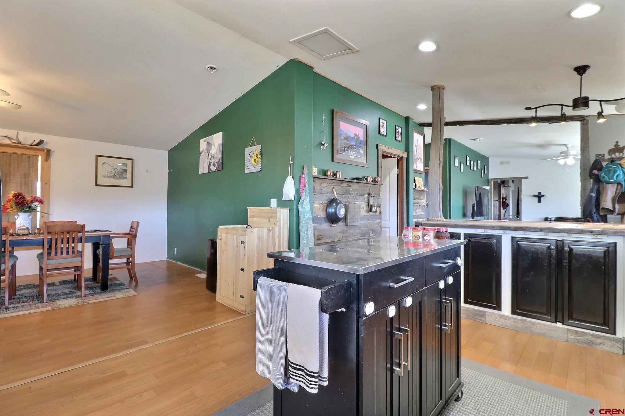 34607 F50 Road Hotchkiss, CO 81419 - Photo 22 of 35 a view of kitchen island kitchen island dining table and chairs
