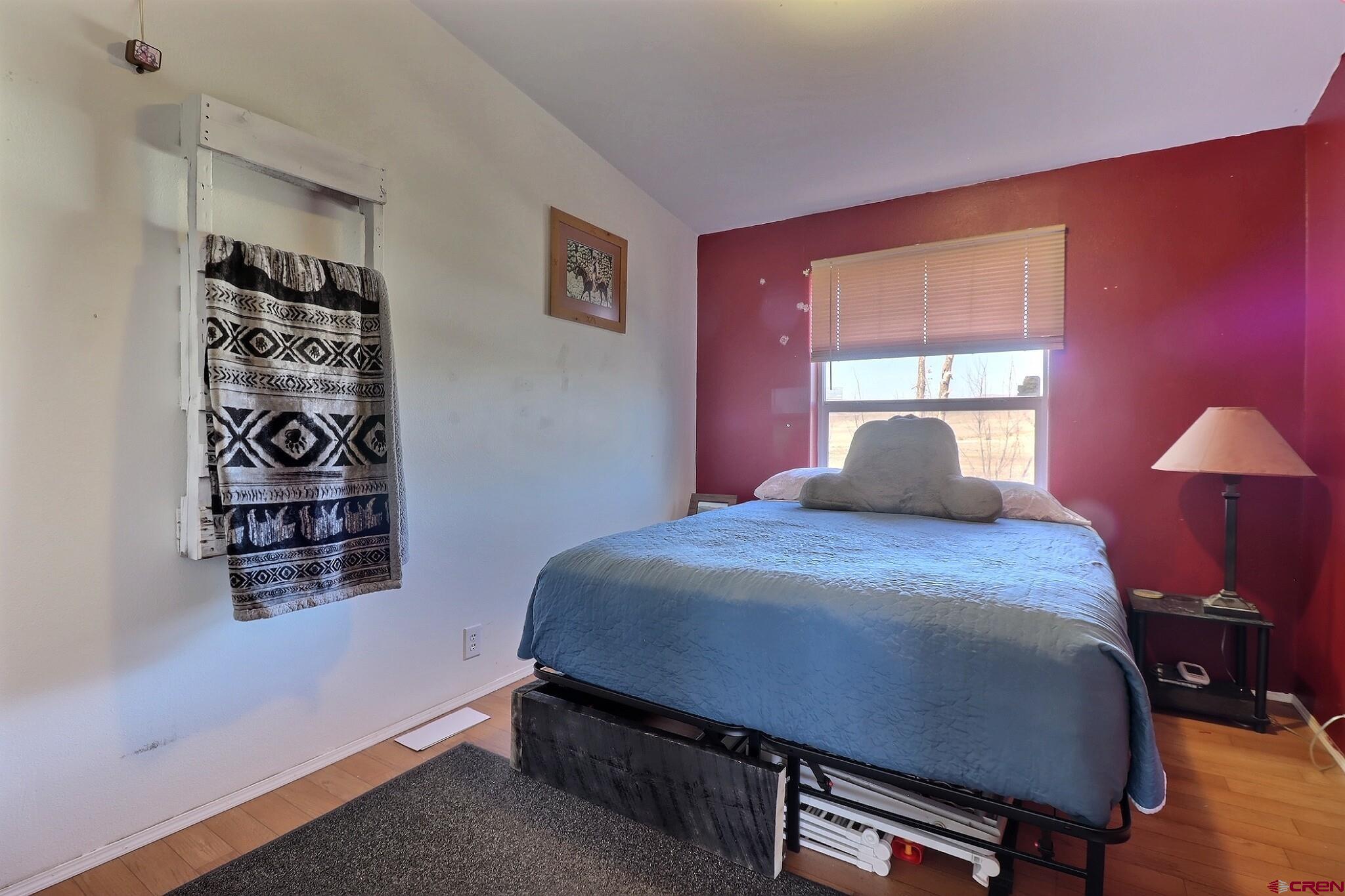 34607 F50 Road Hotchkiss, CO 81419 - Photo 24 of 35 a bedroom with a bed and a window
