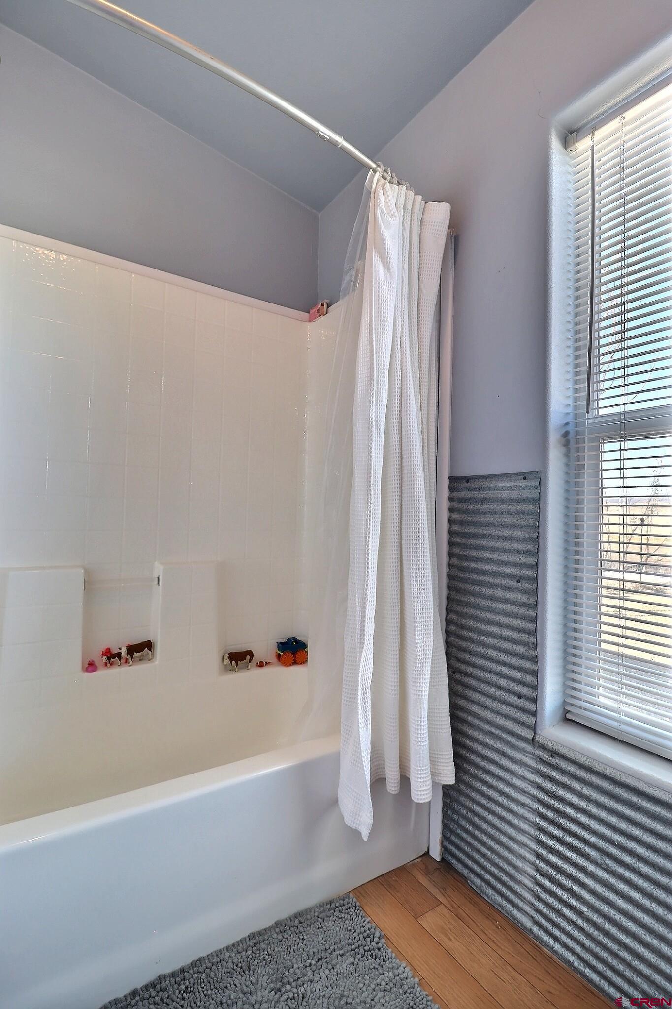 34607 F50 Road Hotchkiss, CO 81419 - Photo 33 of 38 a bathroom with a bathtub and a shower