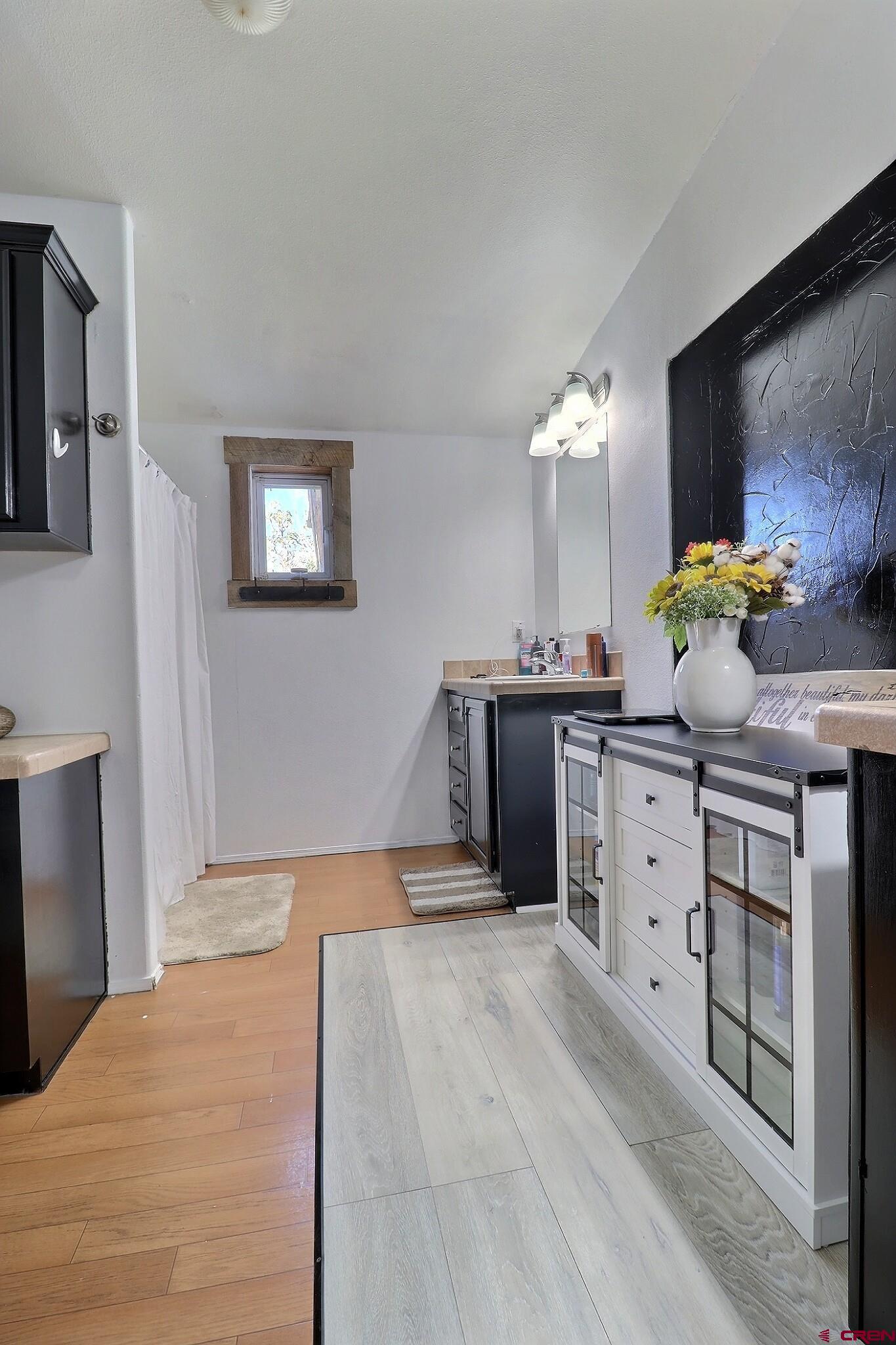 34607 F50 Road Hotchkiss, CO 81419 - Photo 33 of 35 a bedroom with a bed and a dresser