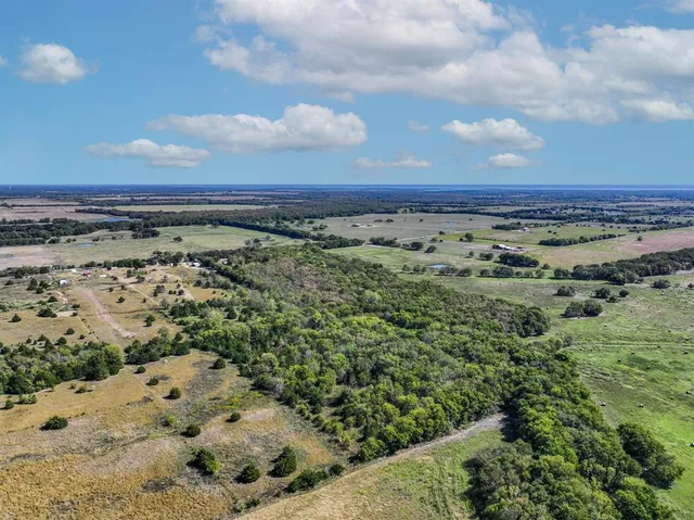 a view of a yard with an outdoor space