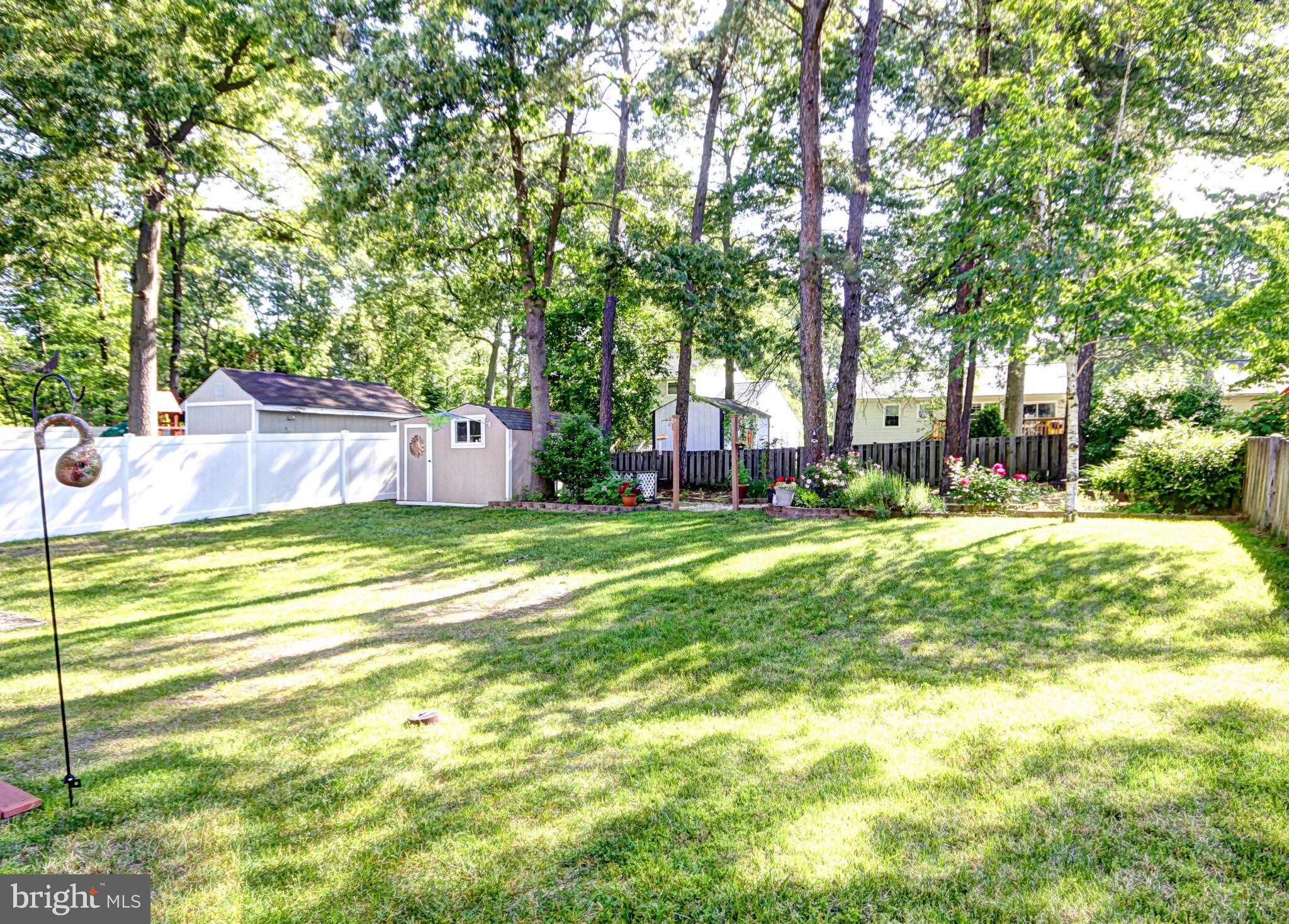 7707 Mahogany Road Severn, MD 21144 - Photo 28 of 30 a view of a house with a yard