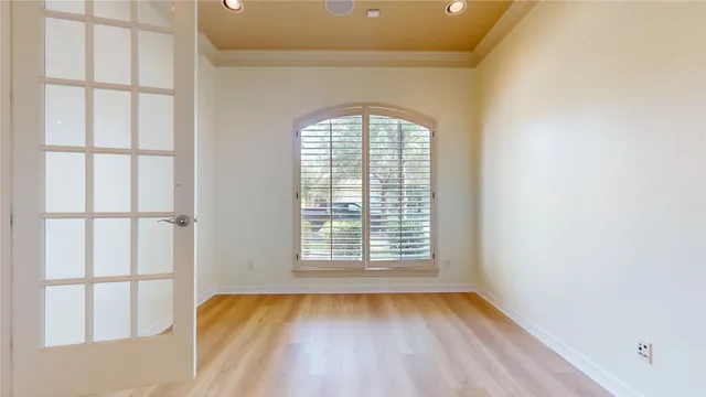 a view of a balcony with wooden floor