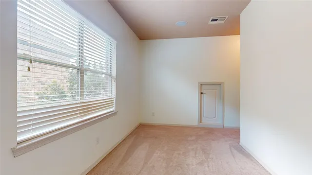 a view of a swimming pool with a yard