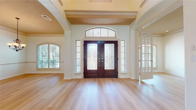 a kitchen with a sink a stove and a refrigerator